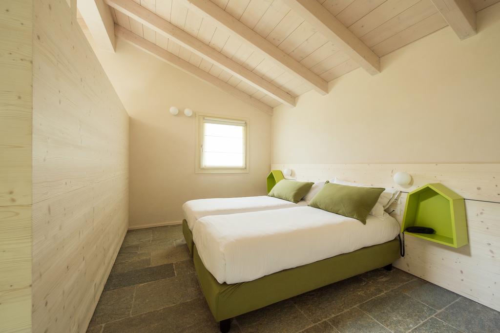 Quader Nidi Nel Verde Bienno Habitación foto